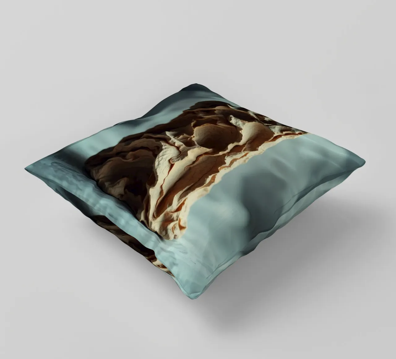 Unique textured sculpture displayed against a soft gray decorative cushion by DesignDoodle