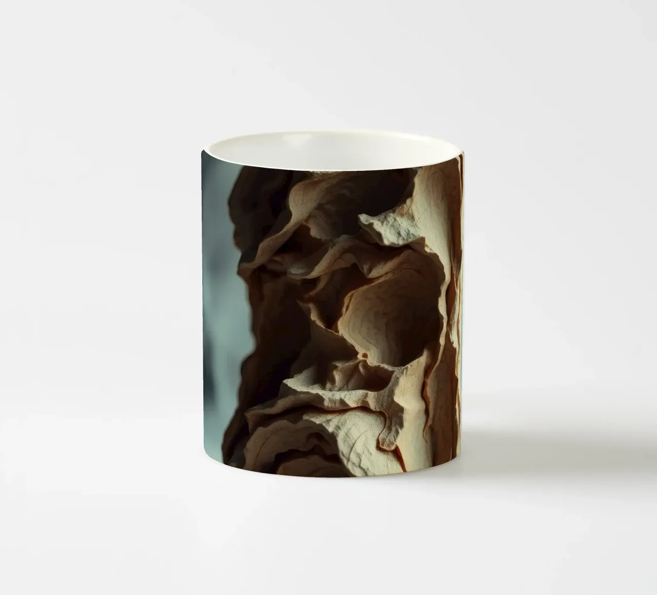 Unique textured sculpture displayed against a soft gray ceramic mug by DesignDoodle