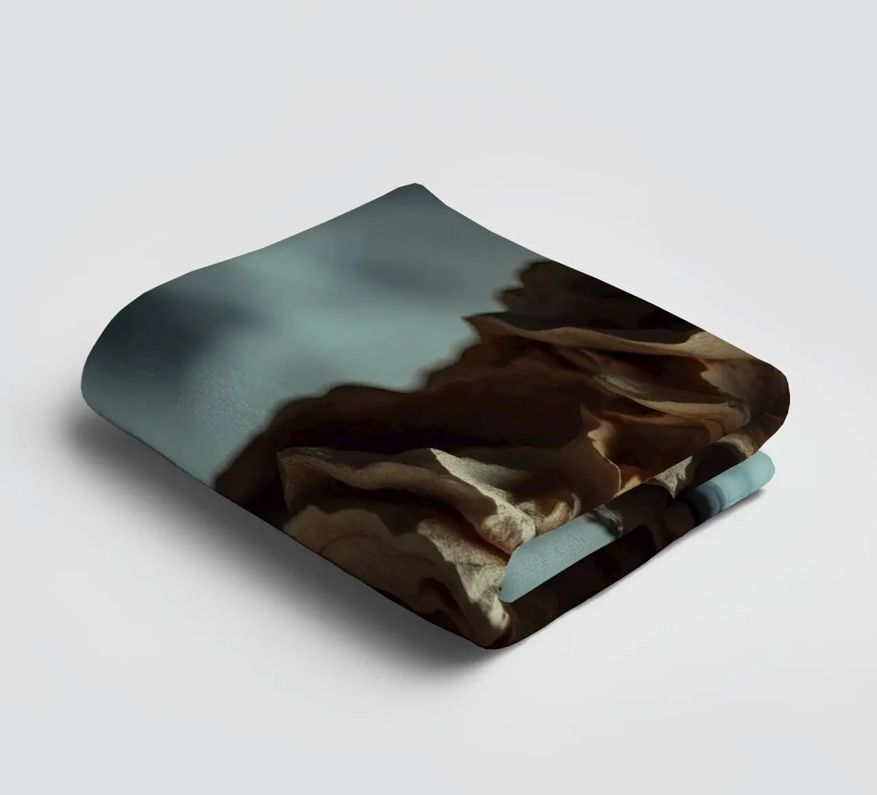 Unique textured sculpture displayed against a soft gray towel by DesignDoodle