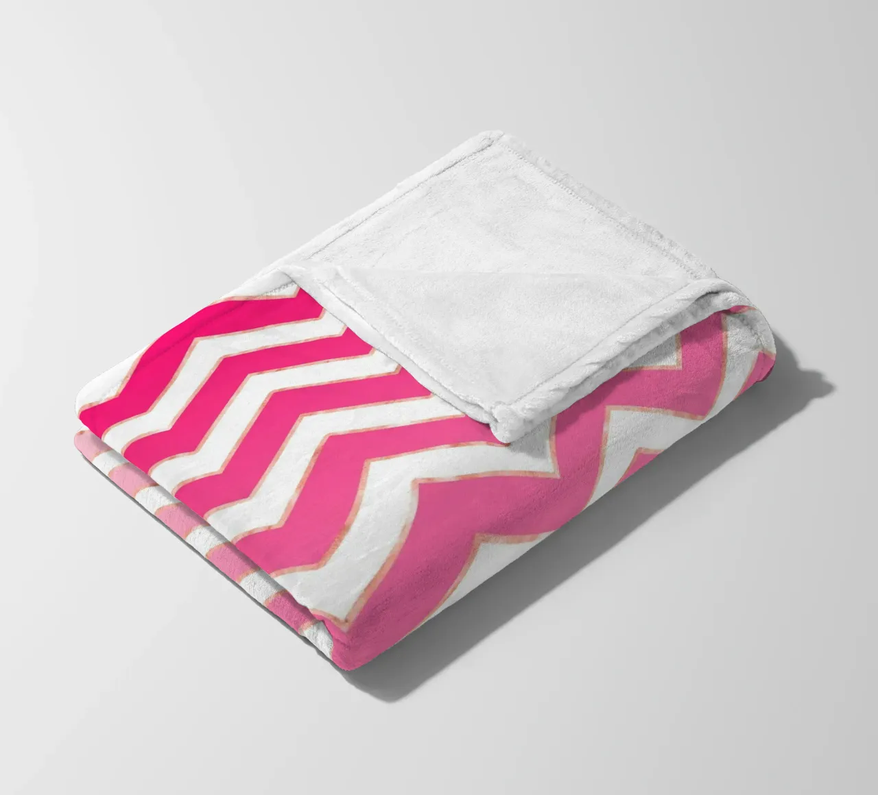 Motivo a zig zag in rosa e bianco con accenti in oro rosa coperta in pile da CalliLetters