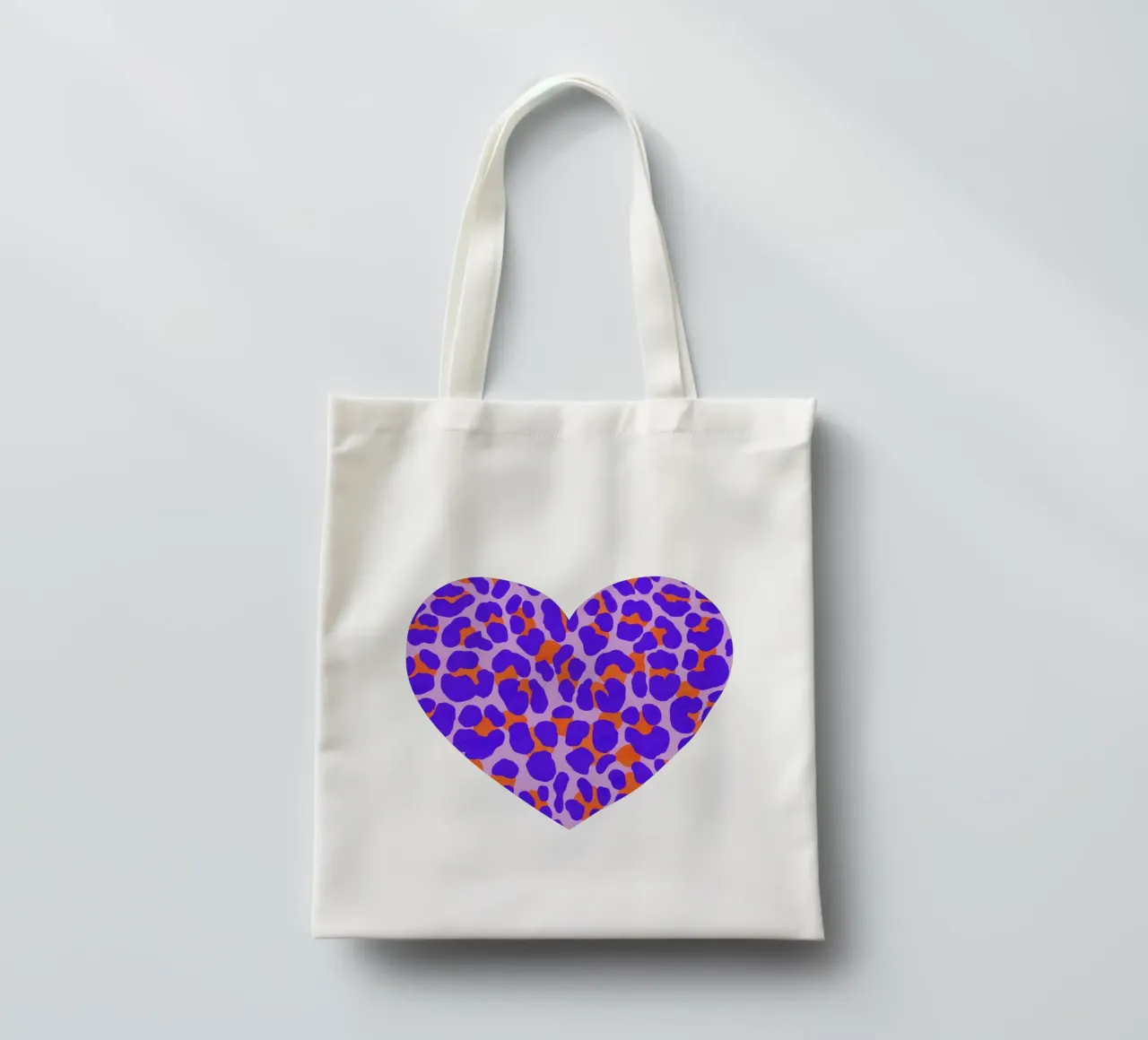 Leopard pattern. Modern with purple and orange. tote bag by CalliLetters
