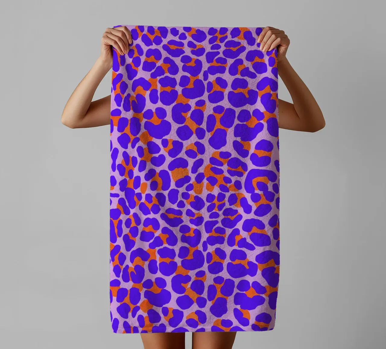 Leopard pattern. Modern with purple and orange. towel by CalliLetters