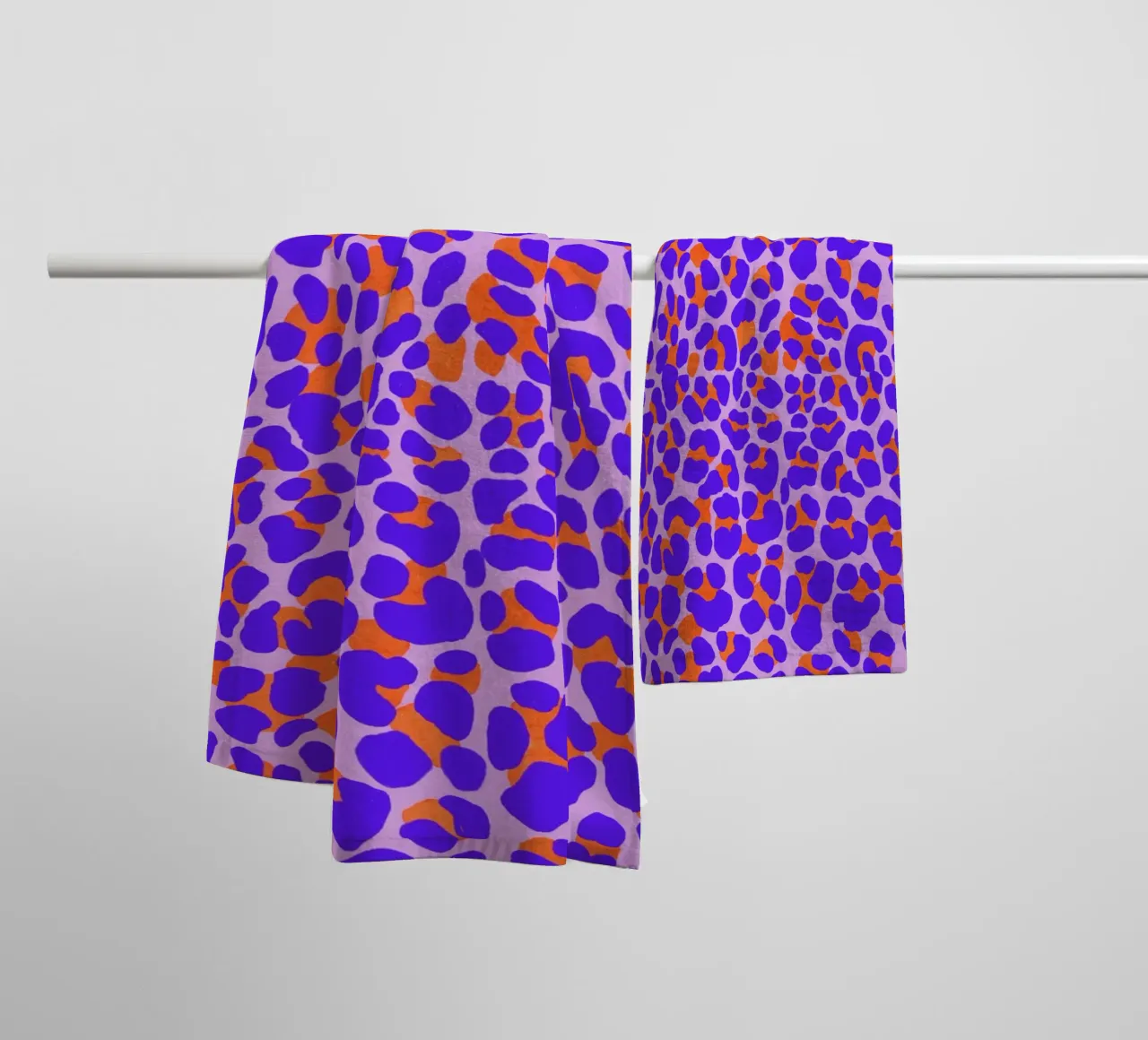 Leopard pattern. Modern with purple and orange. towel by CalliLetters