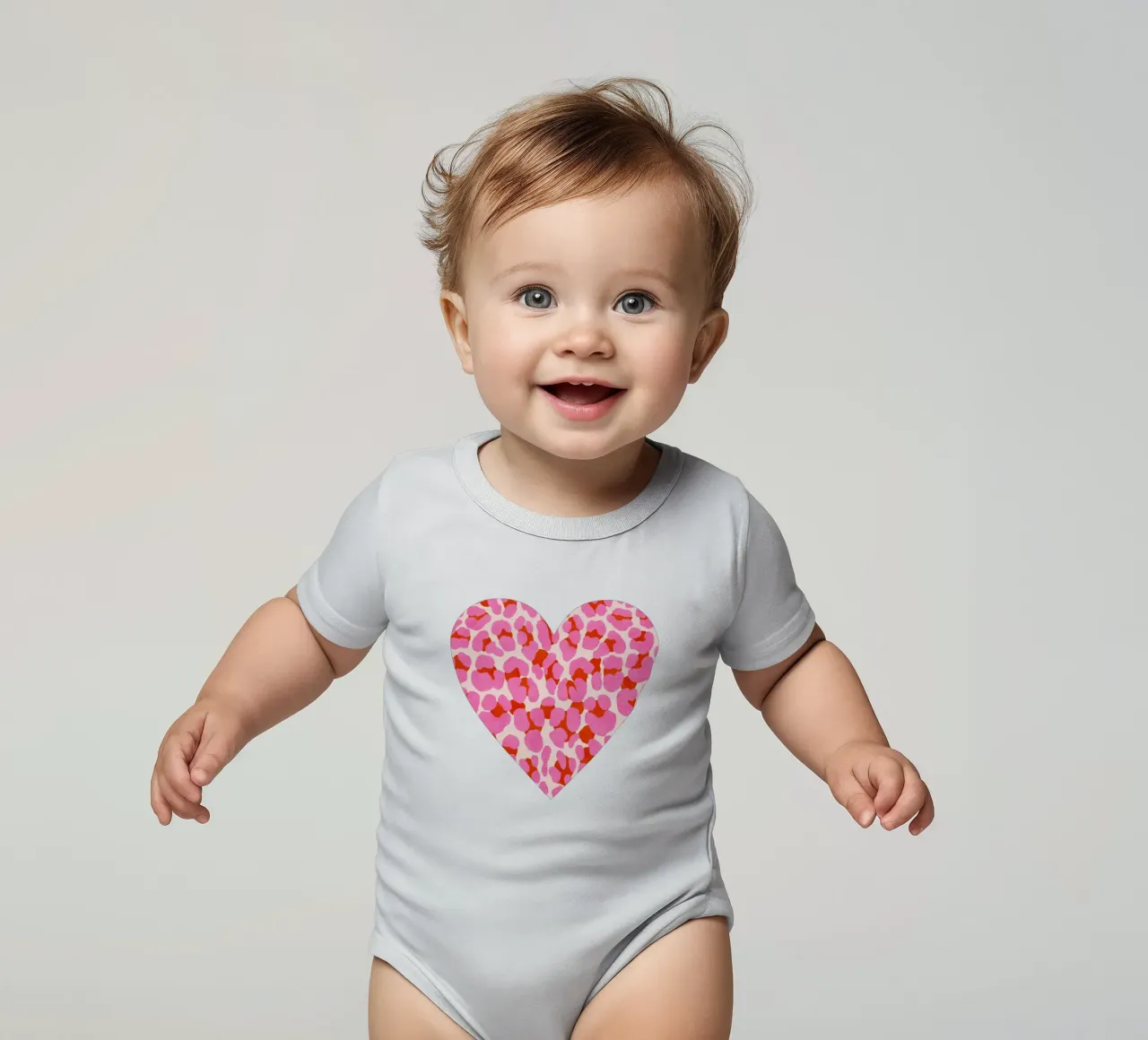 Leopard pattern. Modern in pink, red and abricot. With heart. short-sleeve baby romper by CalliLetters