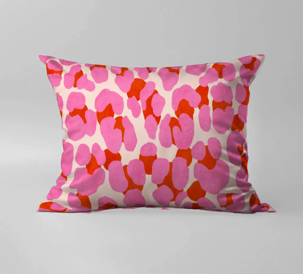 Leopard pattern. Modern in pink, red and abricot. With heart. decorative cushion by CalliLetters