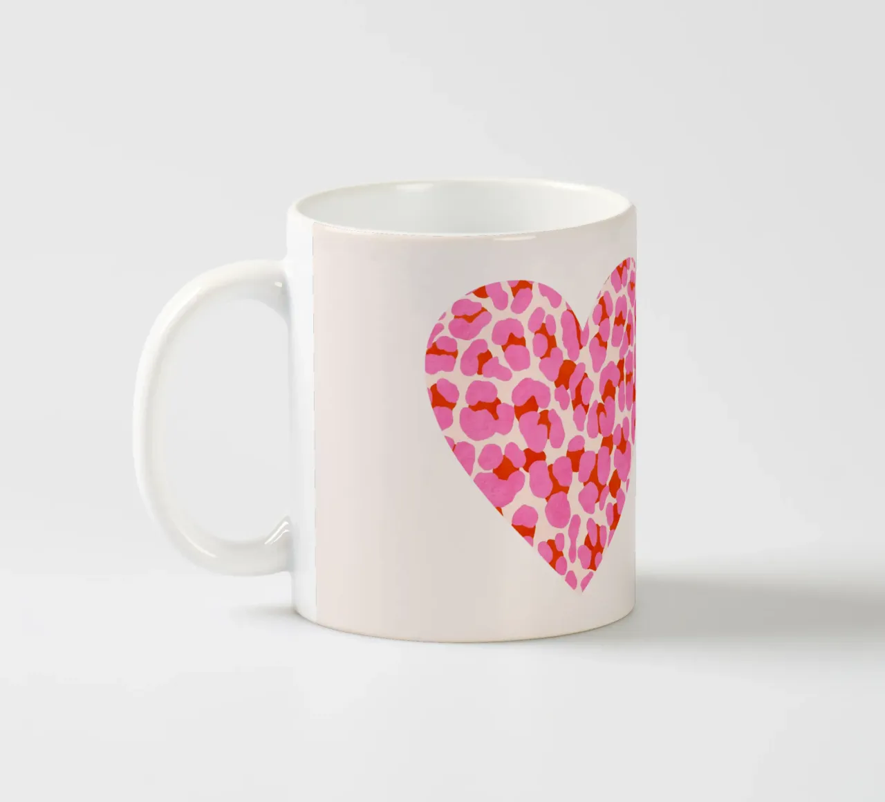 Leopard pattern. Modern in pink, red and abricot. With heart. ceramic mug by CalliLetters