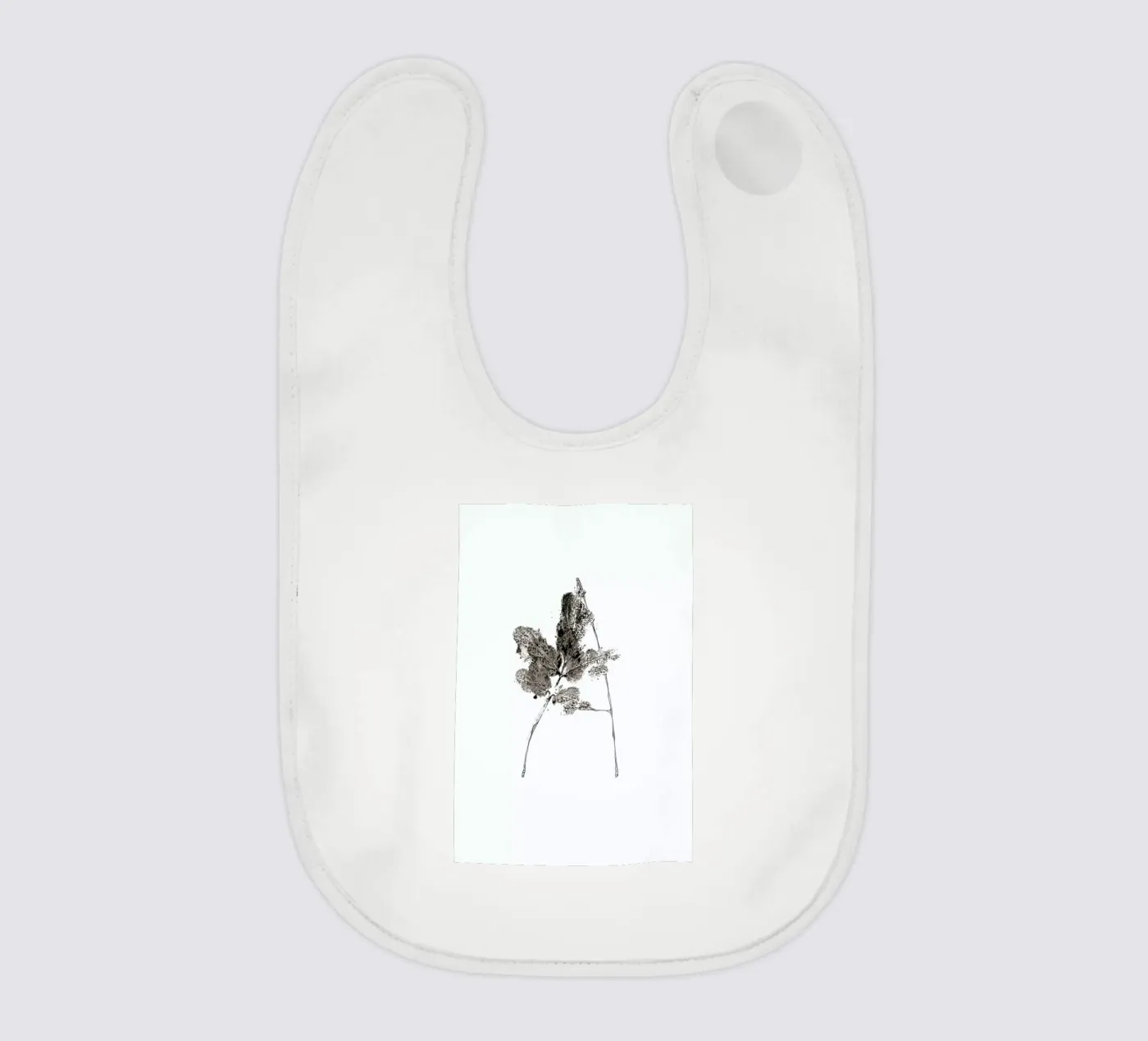 A baby bib by Marina Guiu