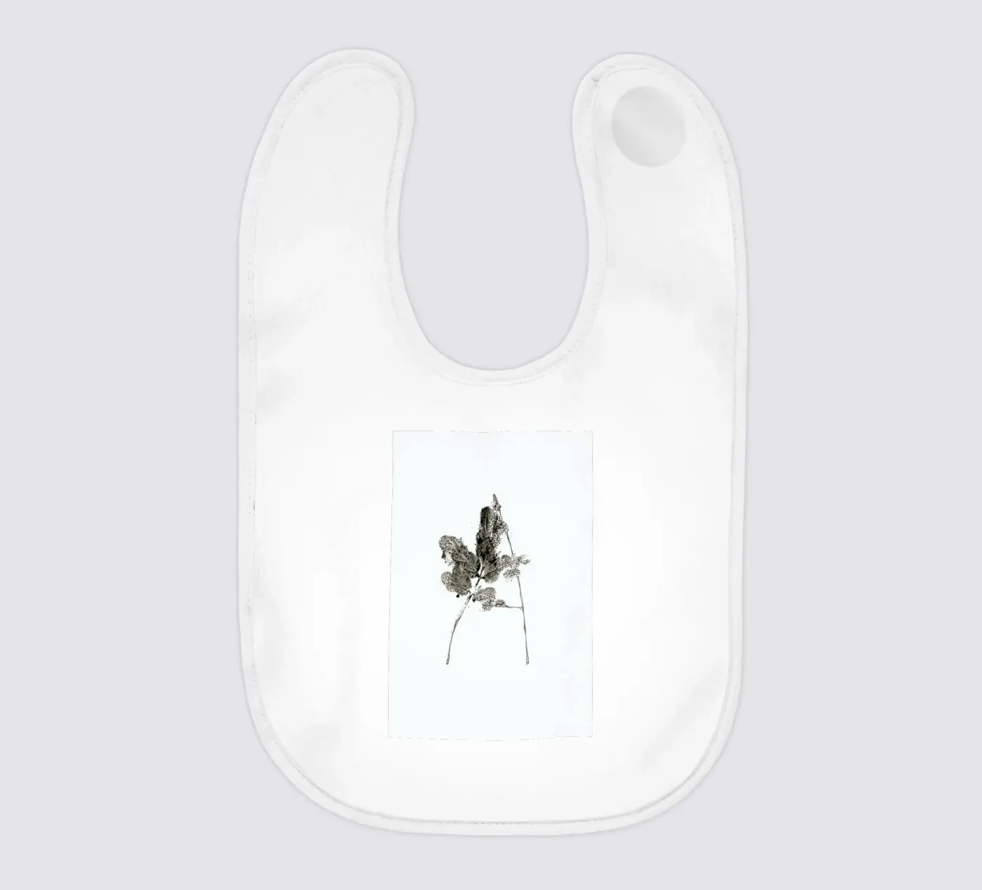 A baby bib by Marina Guiu