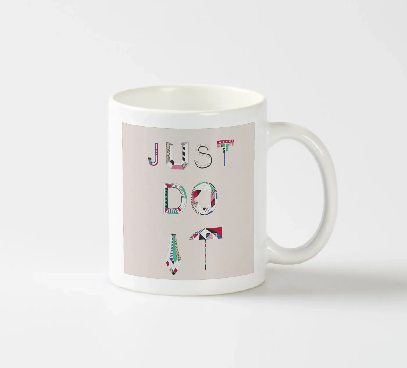 Just do it ceramic mug by Vasare Nar