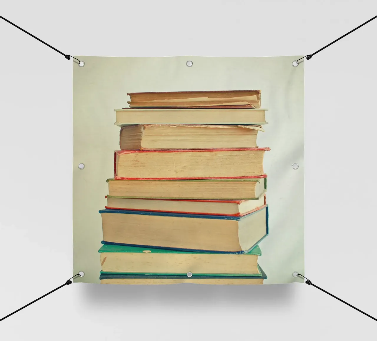 Pila di libri telo in pvc da Cassia Beck Photography
