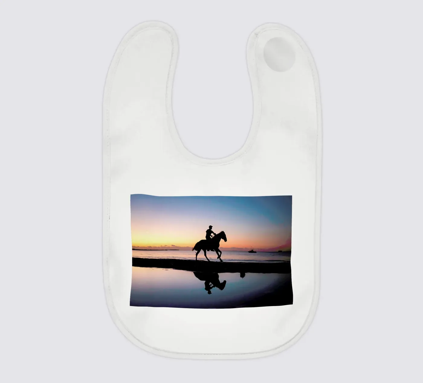 Reflect baby bib by Charlotte Curd