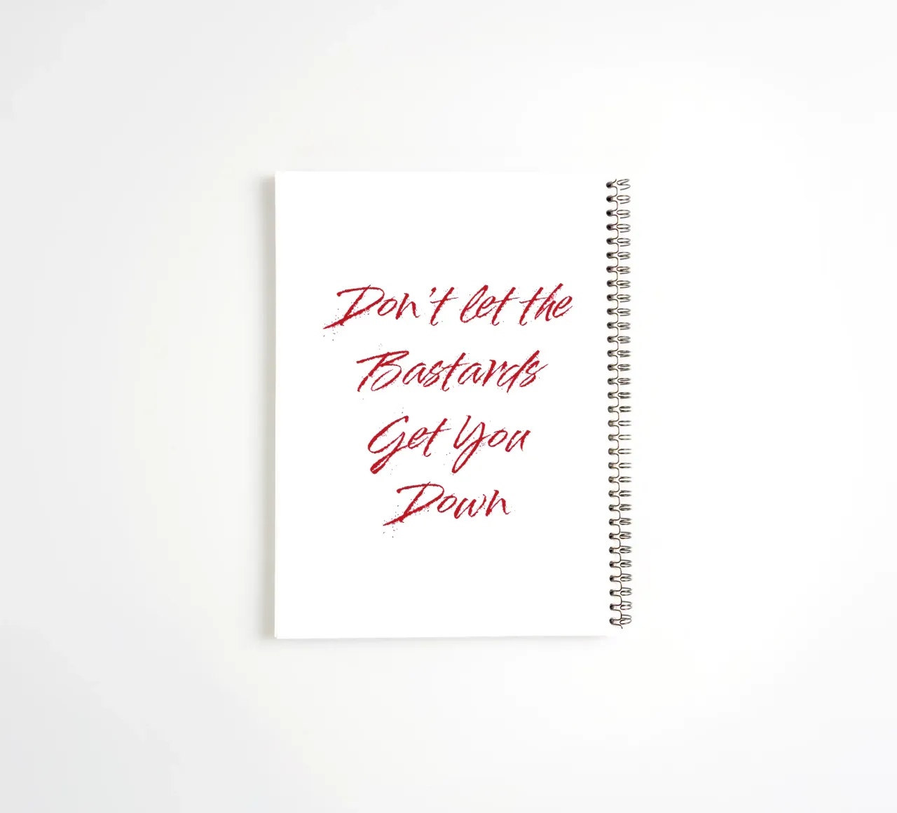 'Don't Let The Bastards Get You Down' - Red Text spiral notebook by FABOArt