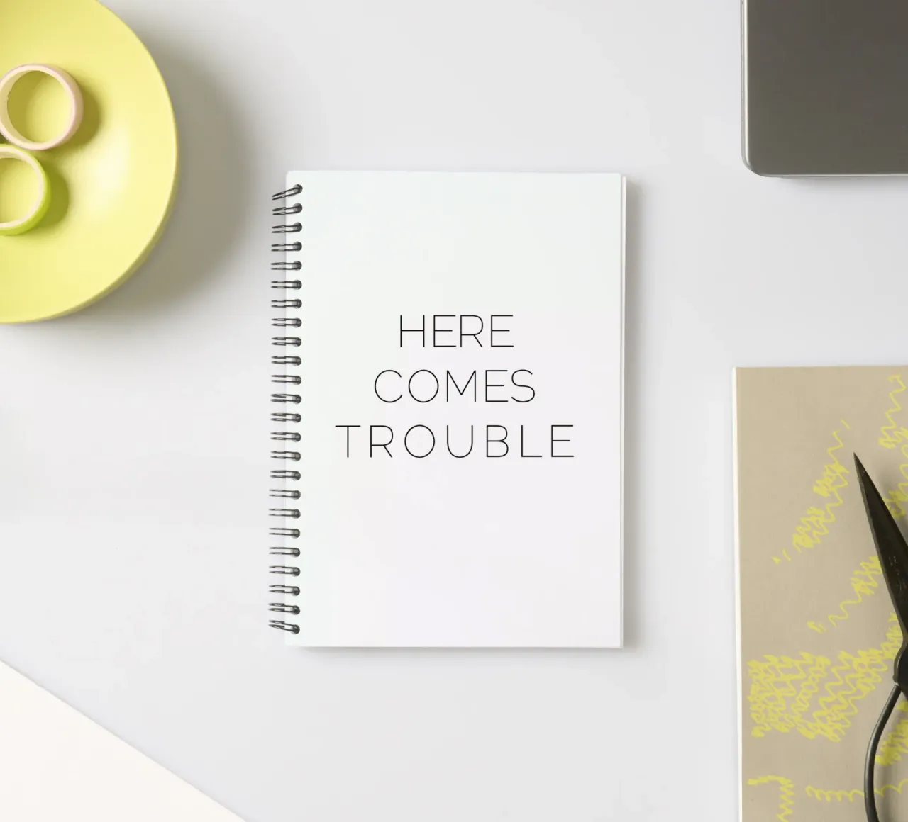 Trouble spiral notebook by Leah Flores