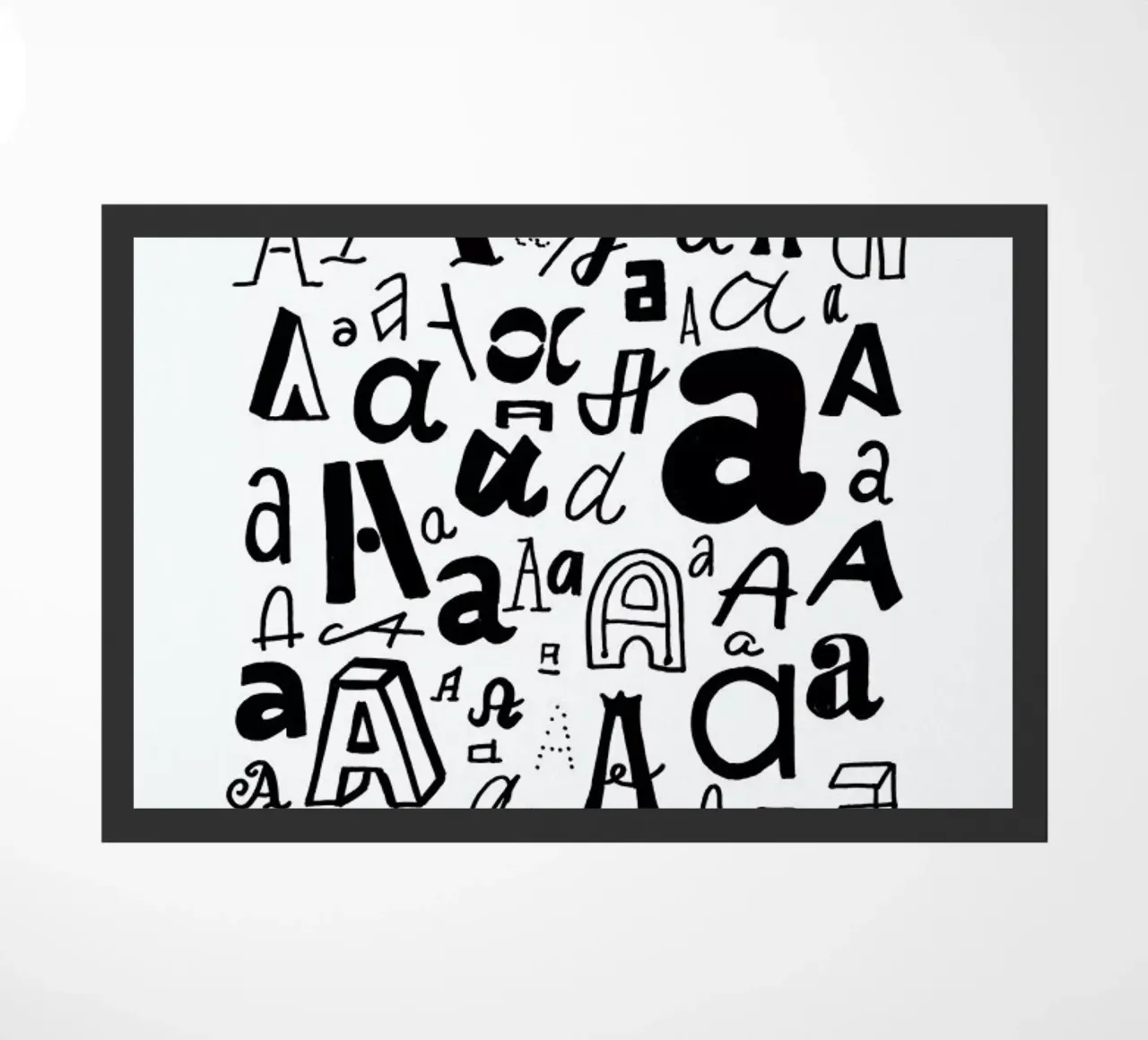 Aa deurmat van petiteCAPS