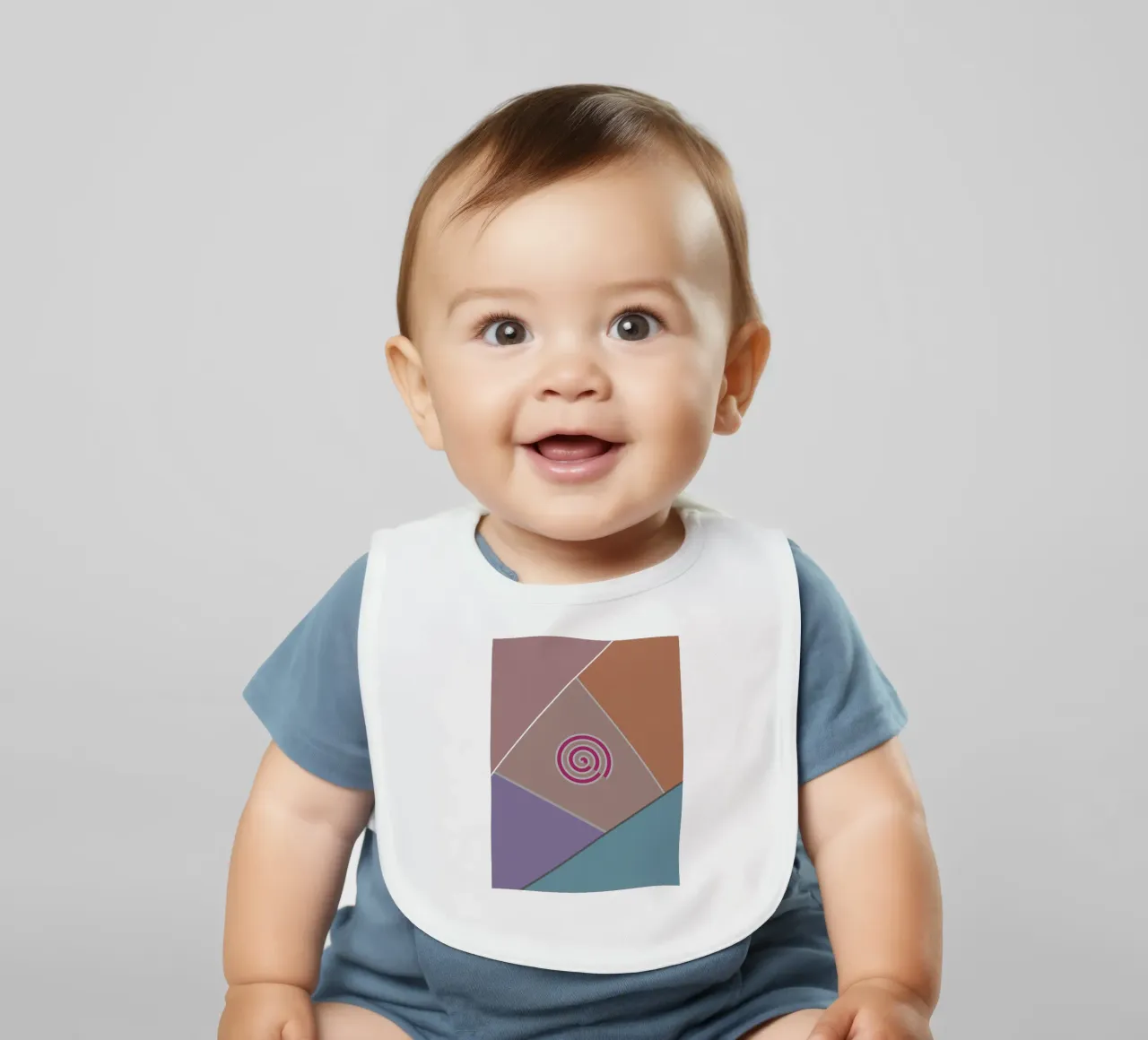 Forme geometriche colorate e una spirale rosa bavaglino da Something for you