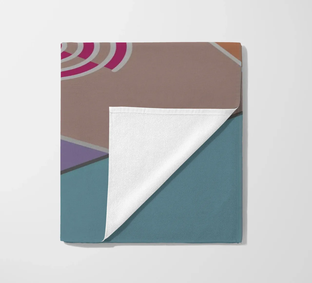 Colourful geometric shapes and a pink spiral beach towel by Something for you