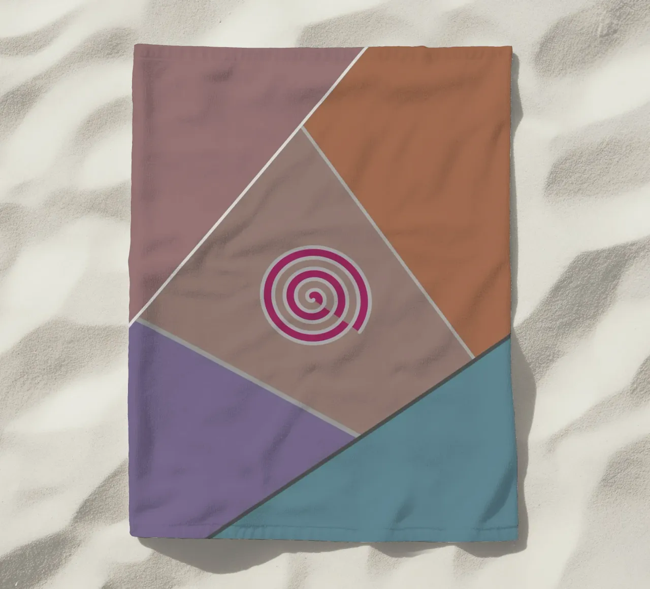 Colourful geometric shapes and a pink spiral beach towel by Something for you