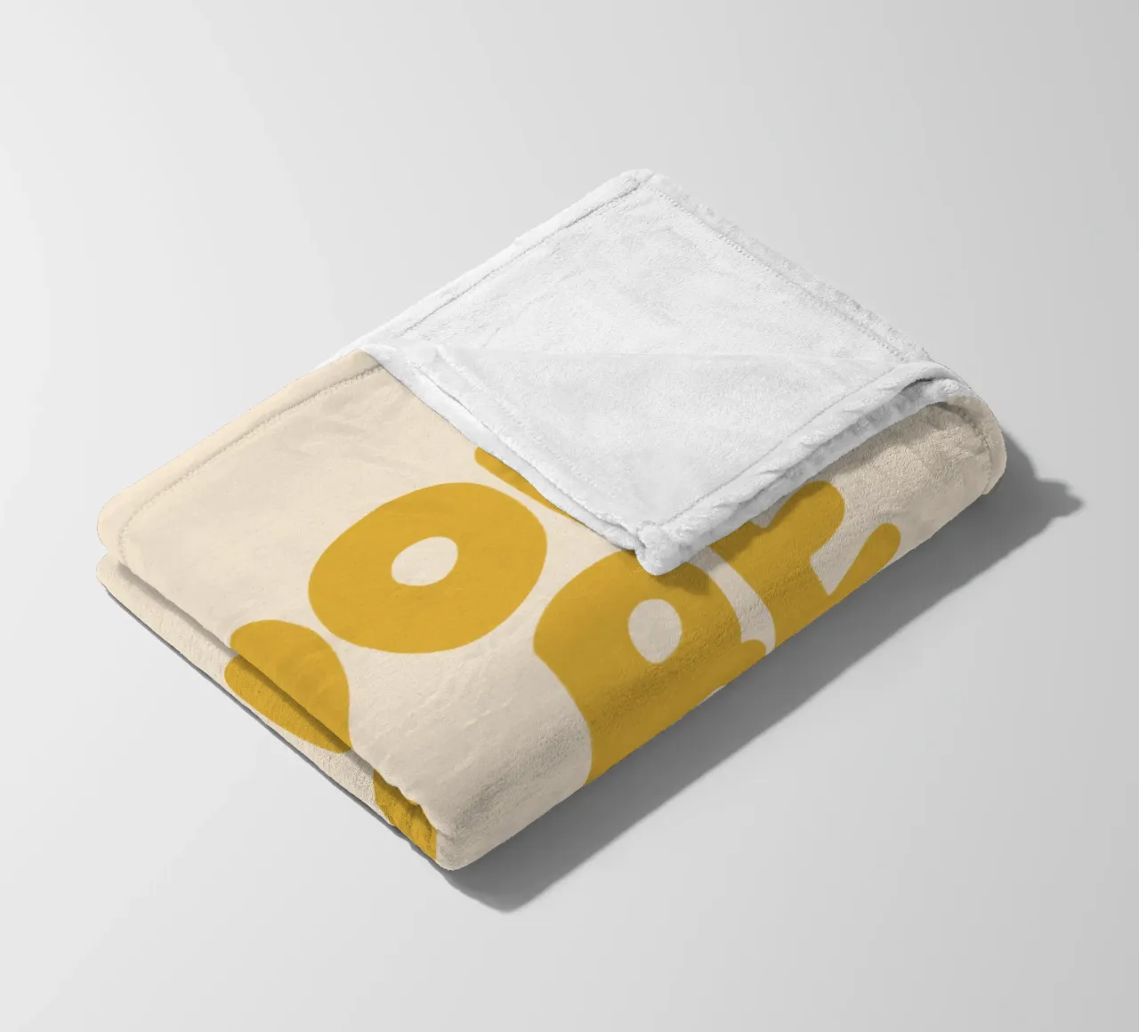 Design tipografico Cool to Be Kind in giallo coperta in pile da THE MOTIVATED TYPE