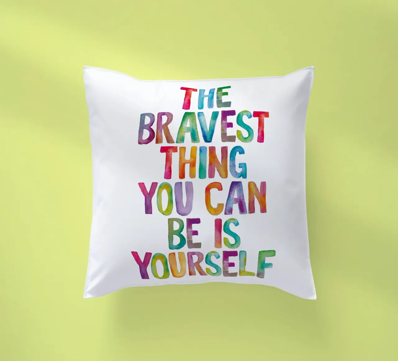 The Bravest Thing You Can Be is Yourself Rainbow Typography decorative cushion by THE MOTIVATED TYPE