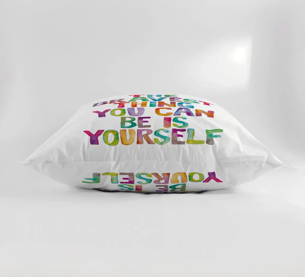 The Bravest Thing You Can Be is Yourself Rainbow Typography decorative cushion by THE MOTIVATED TYPE