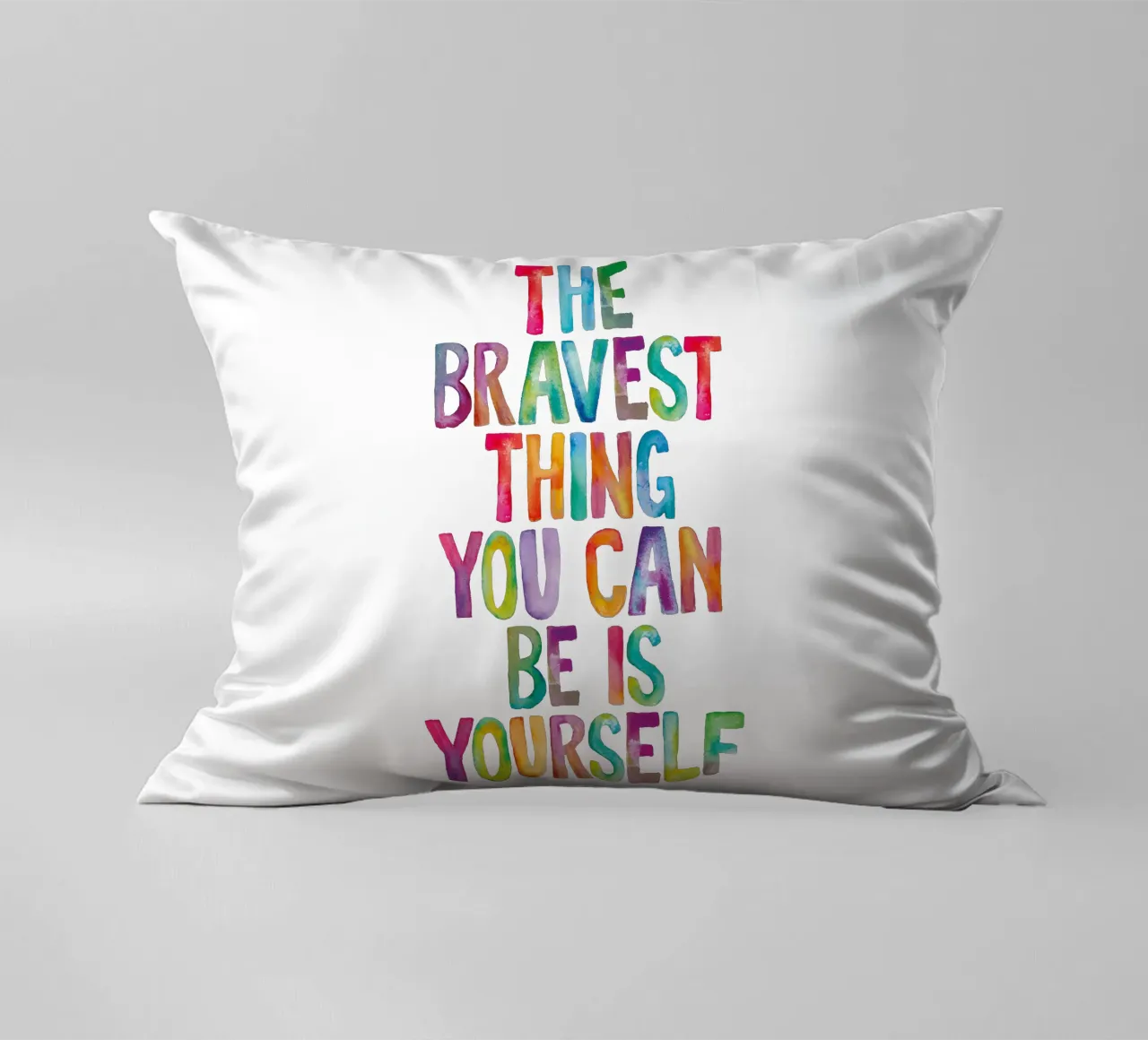 The Bravest Thing You Can Be is Yourself Rainbow Typography decorative cushion by THE MOTIVATED TYPE