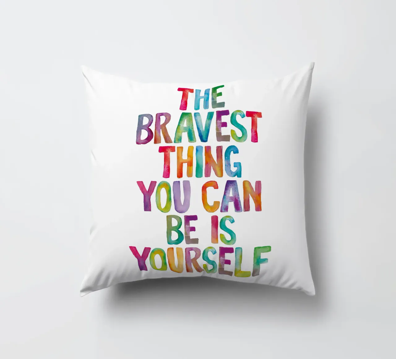 The Bravest Thing You Can Be is Yourself Rainbow Typography decorative cushion by THE MOTIVATED TYPE
