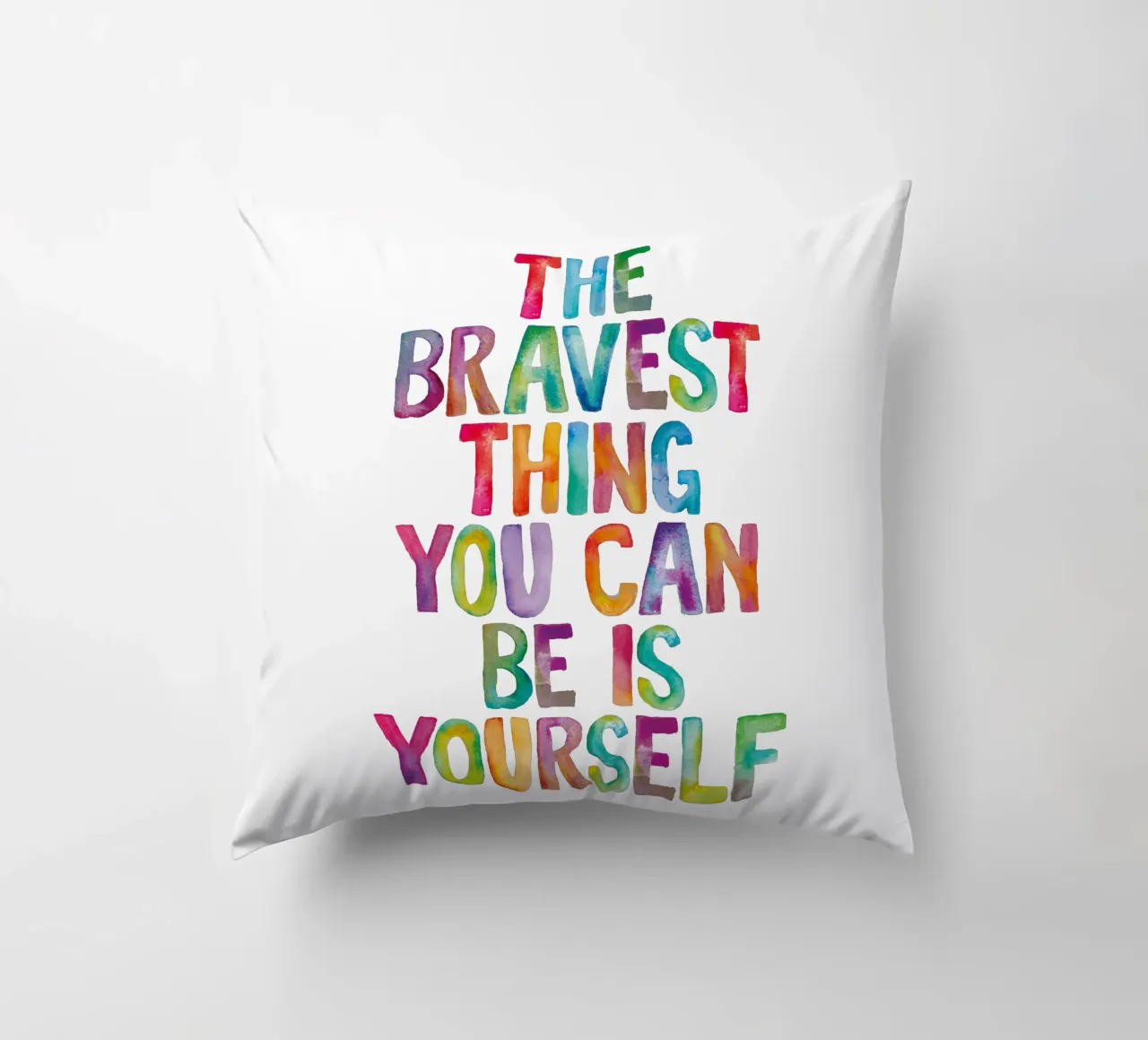 The Bravest Thing You Can Be is Yourself Rainbow Typography decorative cushion by THE MOTIVATED TYPE