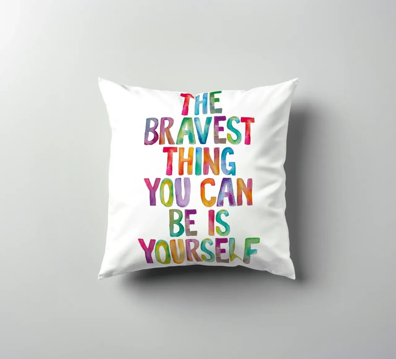 The Bravest Thing You Can Be is Yourself Rainbow Typography decorative cushion by THE MOTIVATED TYPE
