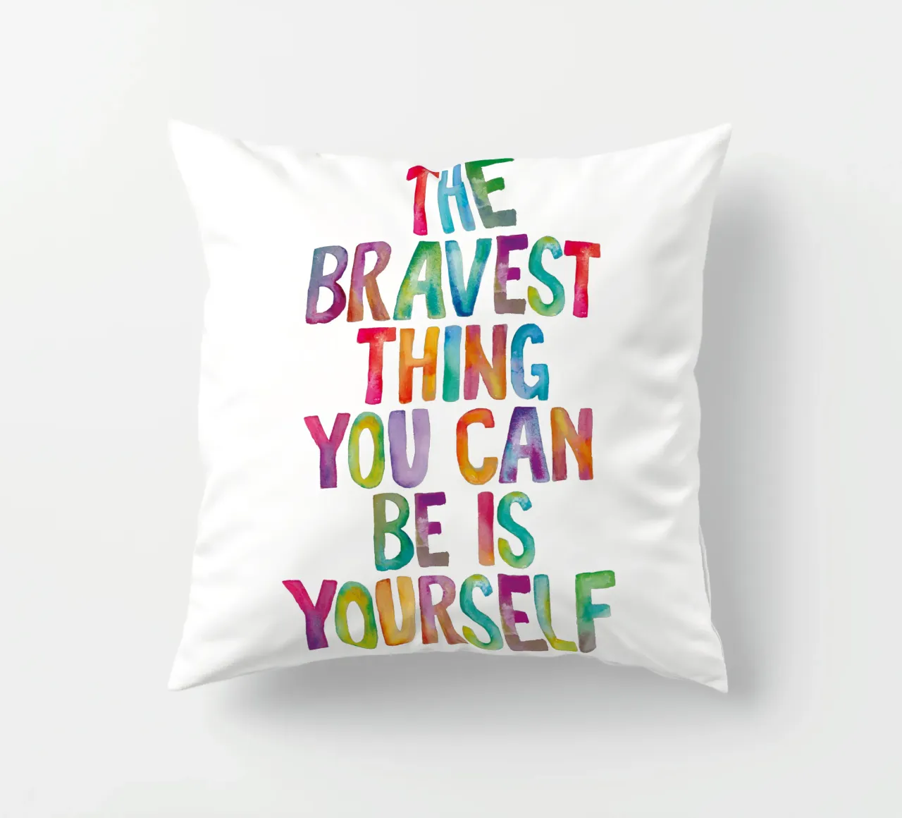 The Bravest Thing You Can Be is Yourself Rainbow Typography decorative cushion by THE MOTIVATED TYPE