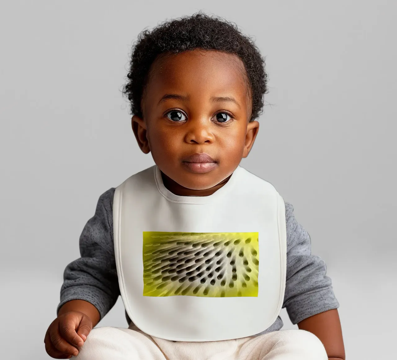 Zwart en geel baby slabbetje van Massimo Frascogna