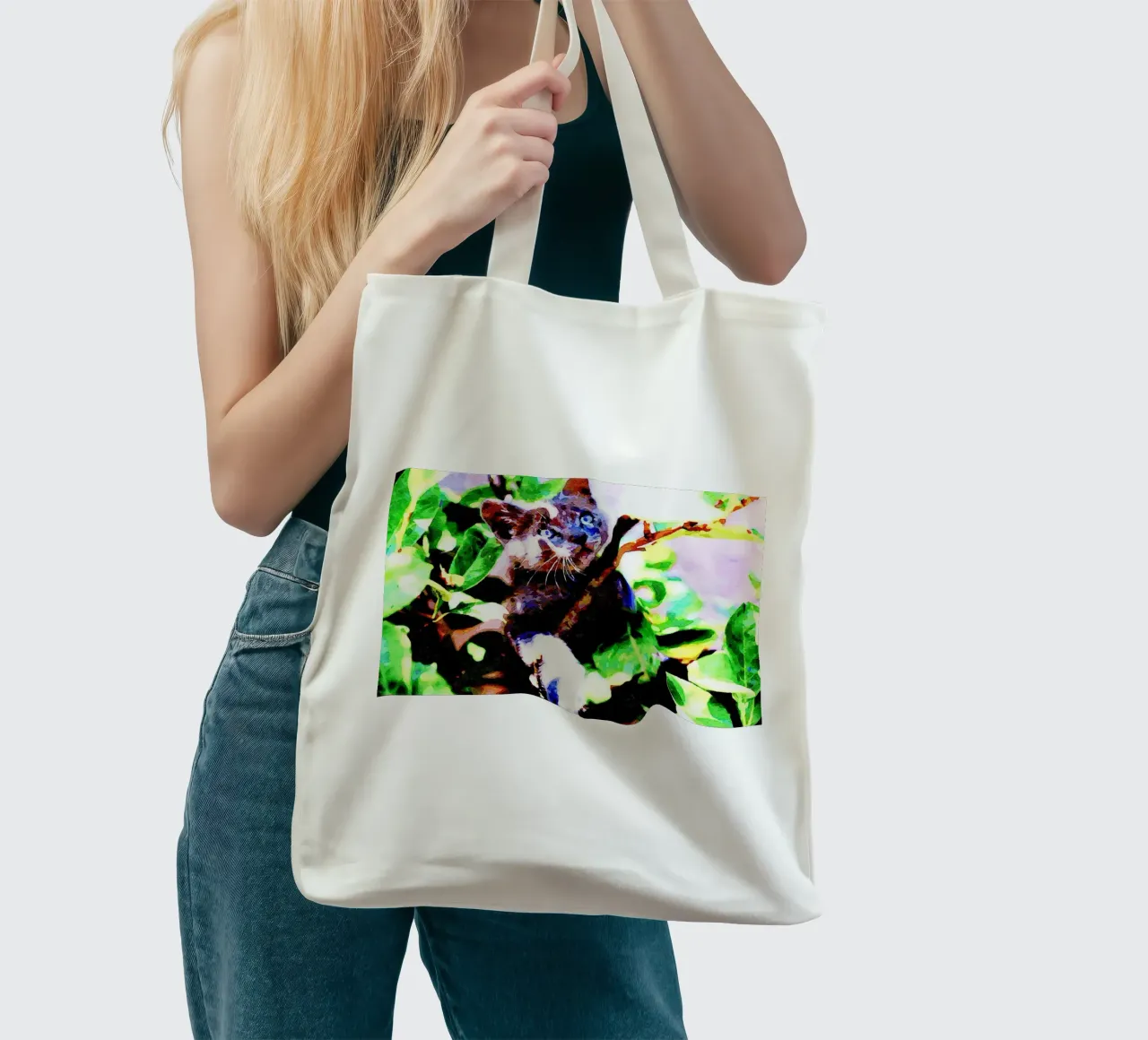Kitten in the green tote bag by Massimo Frascogna