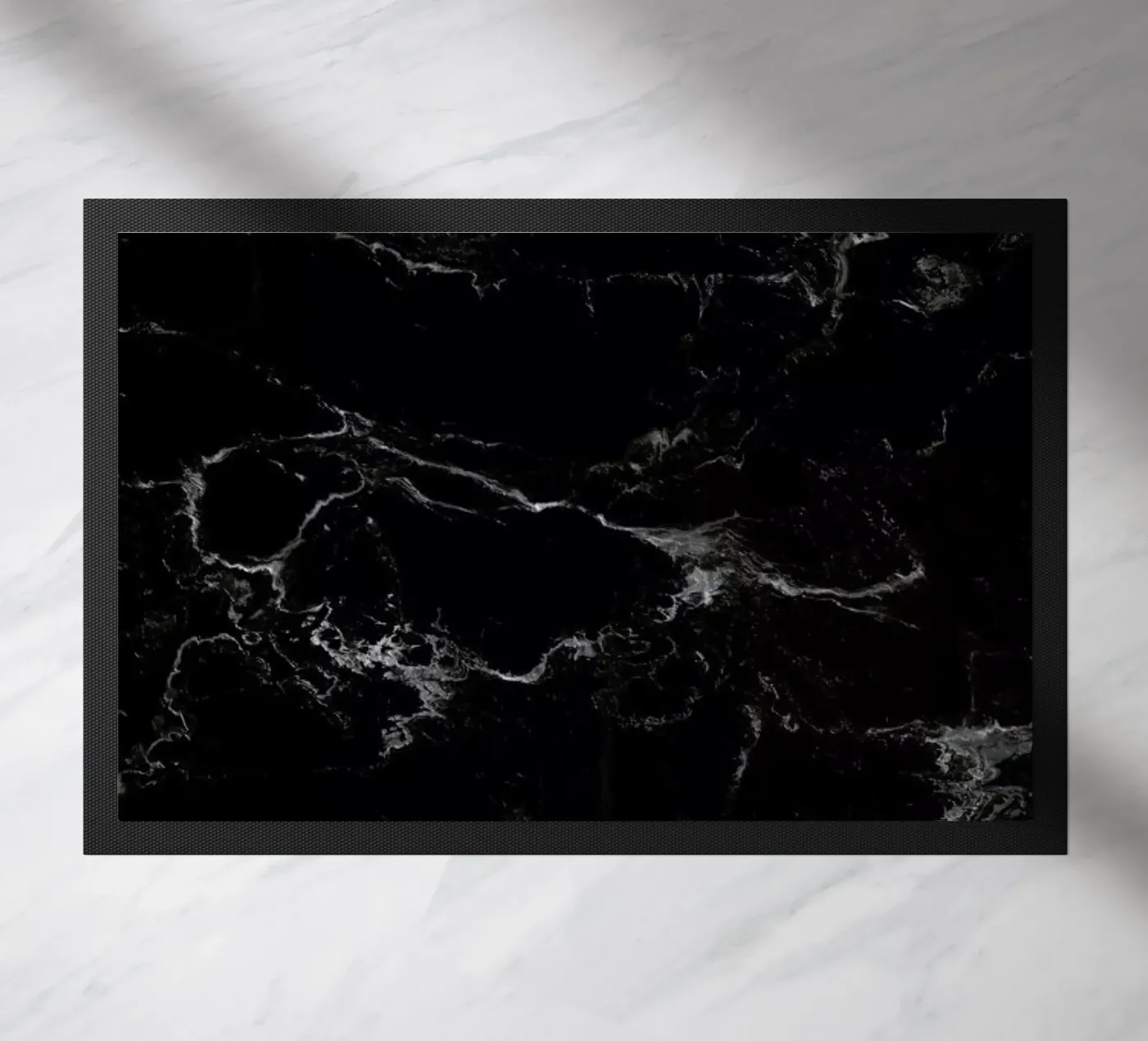 Schwarzer Marmor deurmat van Amy & Kurt