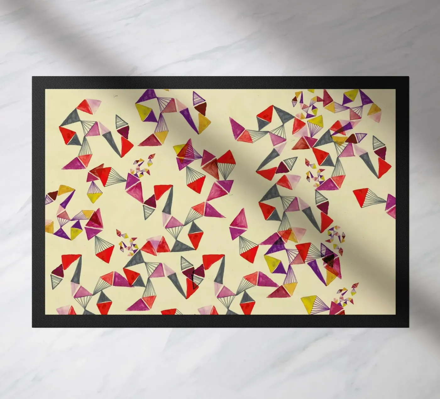 Watercolour triangles doormat by Vasare Nar