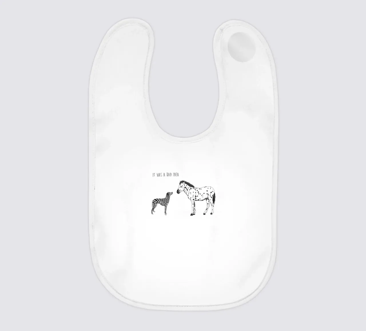 Bad Idea baby bib by Balazs Solti