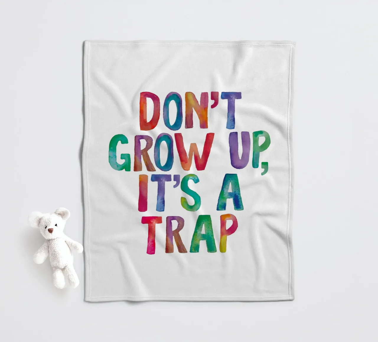 Non crescere è una trappola Design tipografico arcobaleno coperta in pile da THE MOTIVATED TYPE