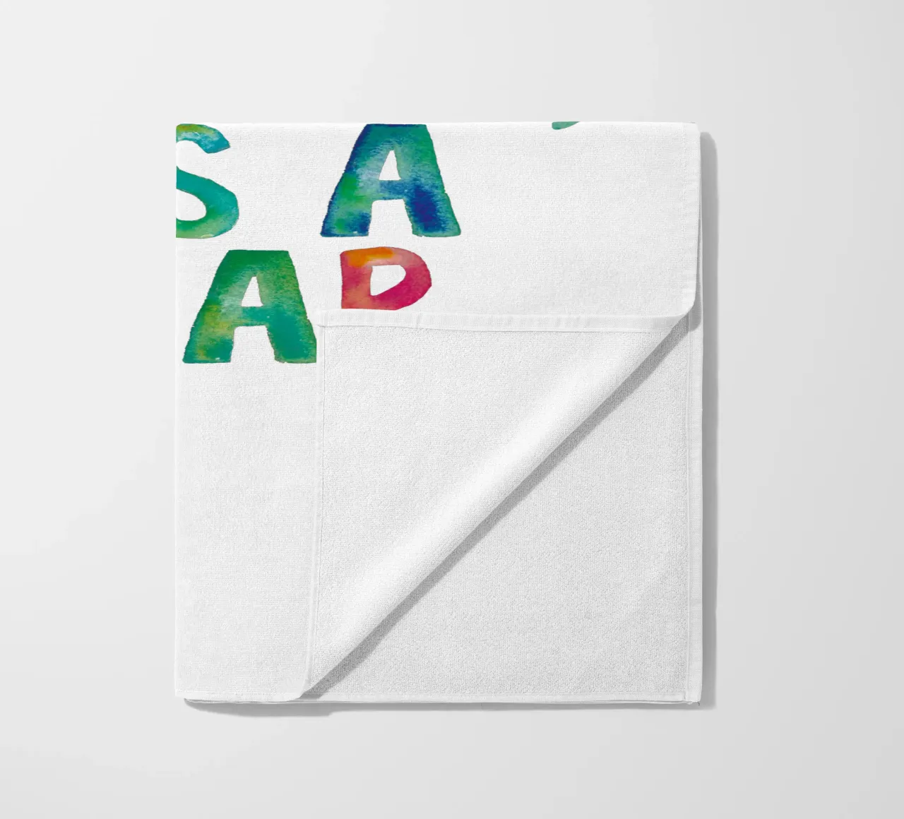Non crescere è una trappola Design tipografico arcobaleno telo mare da THE MOTIVATED TYPE
