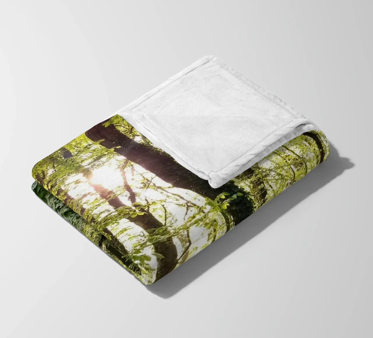 Coucher de soleil entre les arbres fleece blanket by Estelle Création