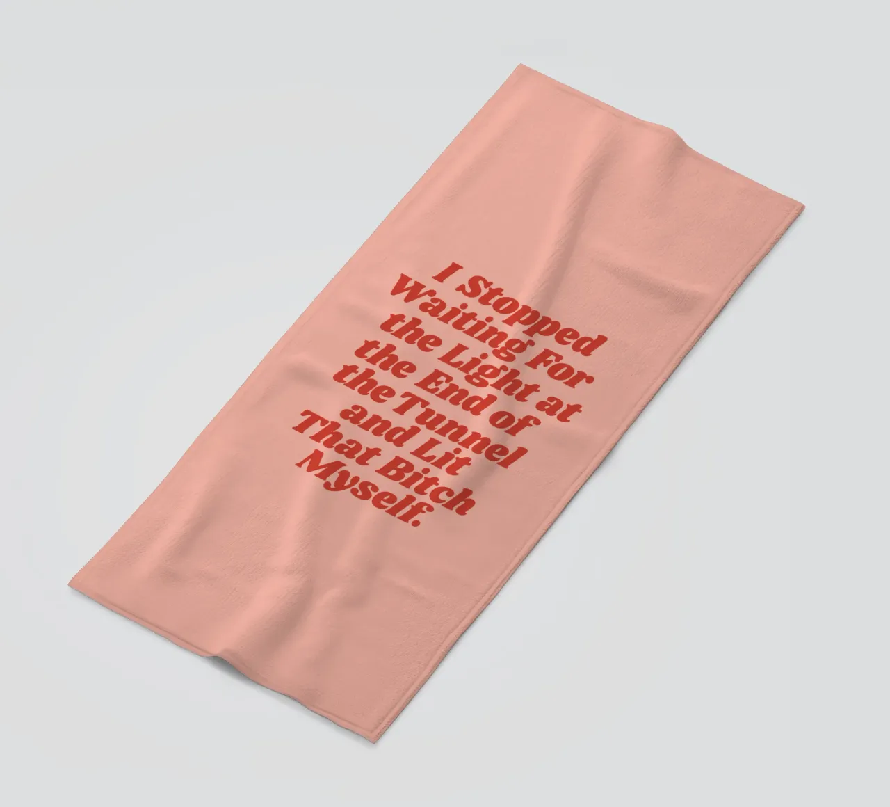 I Stopped Waiting for the Light at the End of the Tunnel beach towel by THE MOTIVATED TYPE