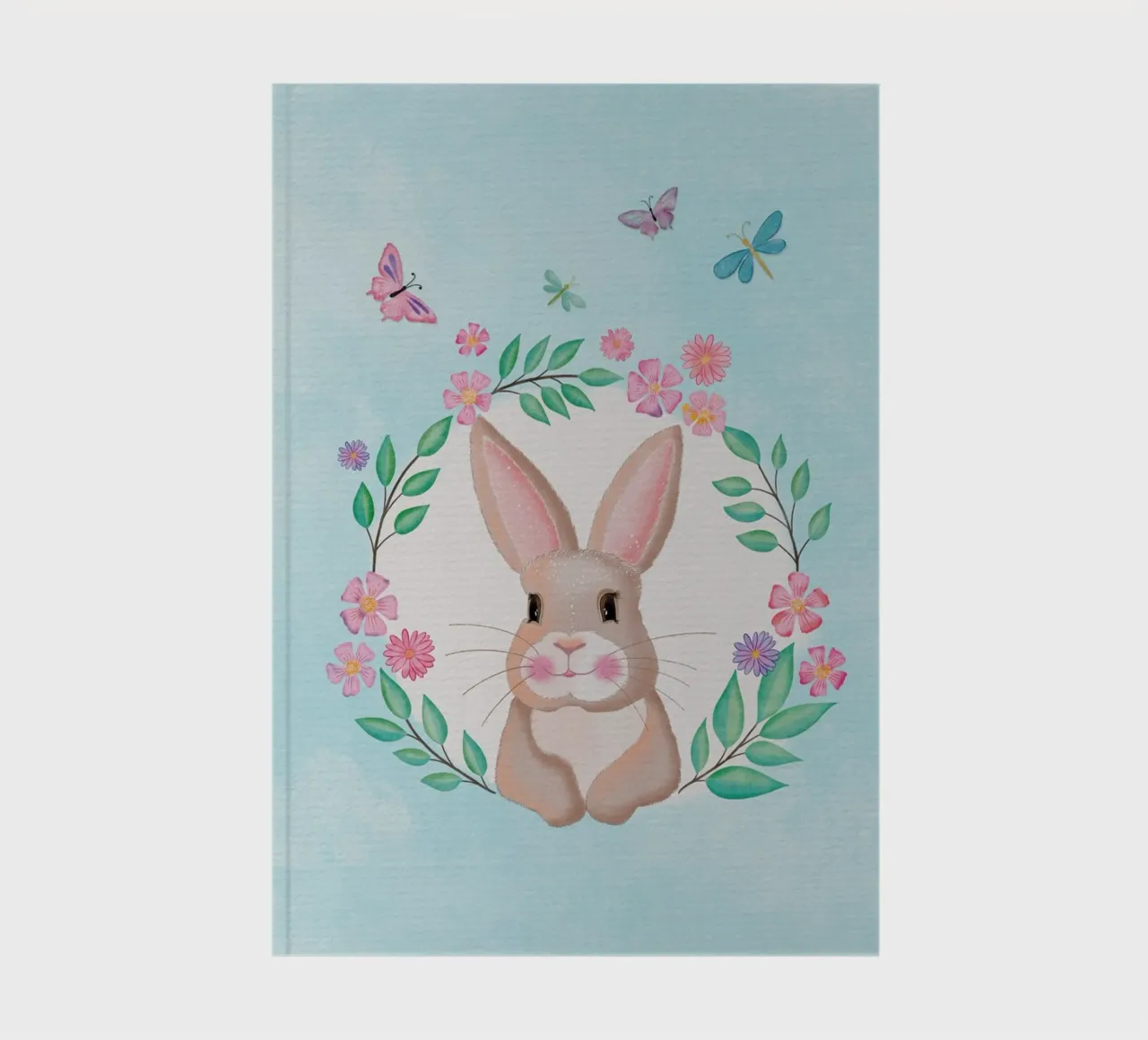 Cute bunny in a wreath of flowers. Not just for Easter. notebook by CalliLetters