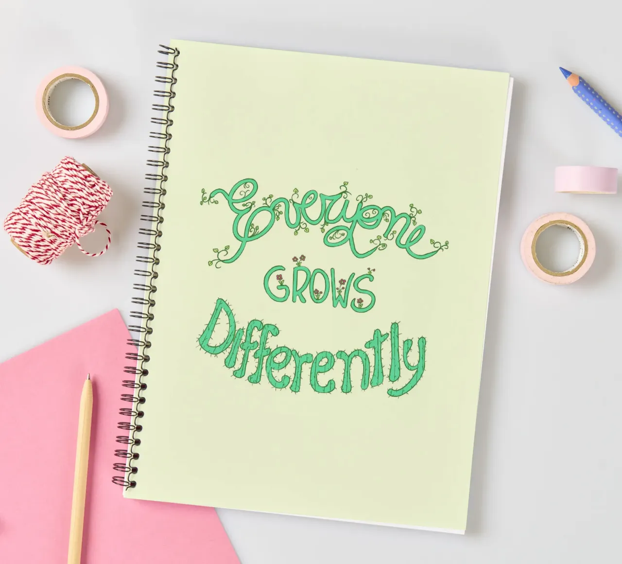 Everyone Grows Differently spiral notebook by Loobs