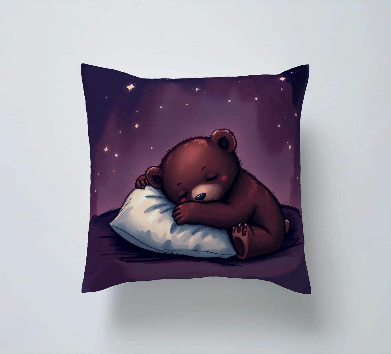 Un mignon ours brun câline un oreiller sous un ciel étoilé coussin de DesignDoodle