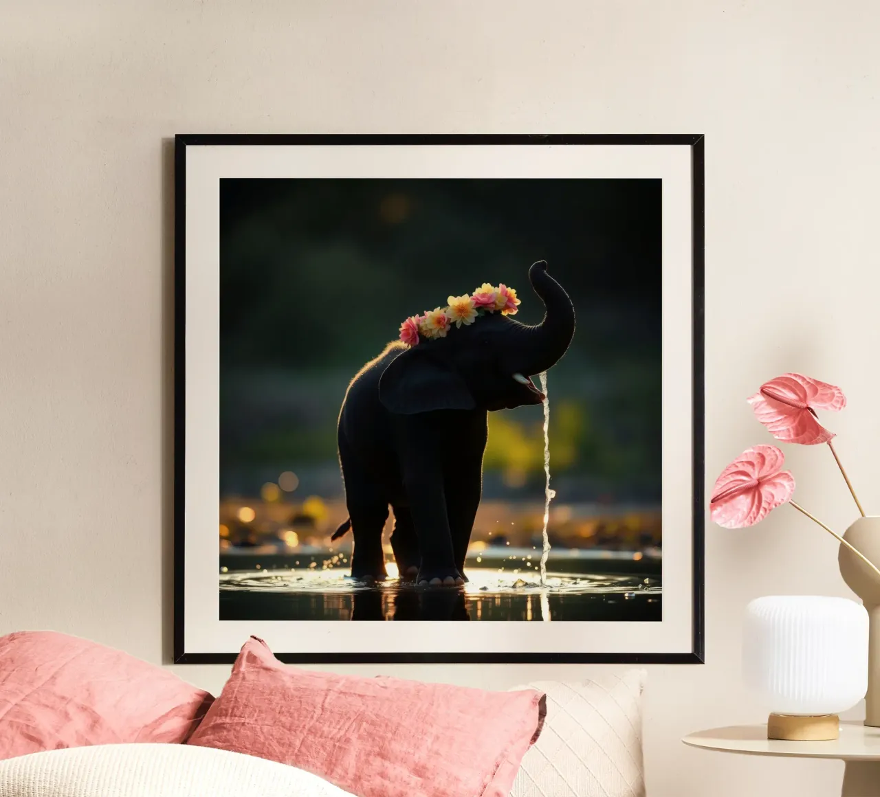 Un elefante adornato di fiori si diverte a giocare con l'acqua al tramonto poster con telaio in plastica da DesignDoodle
