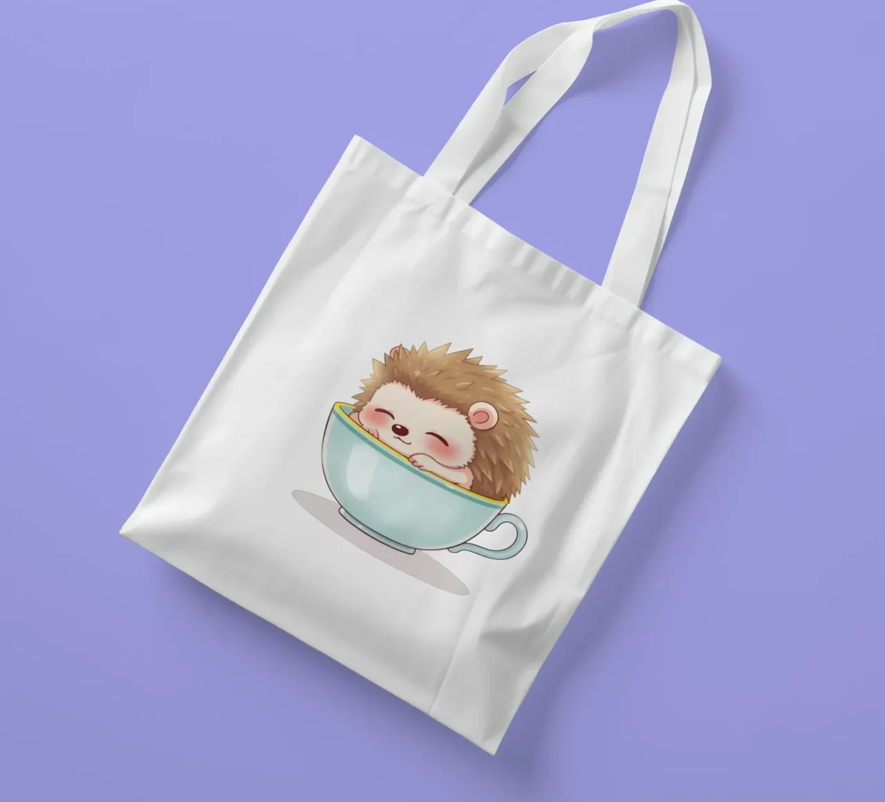 Hérisson mignon se relaxant dans une tasse bleu clair tote bag de DesignDoodle