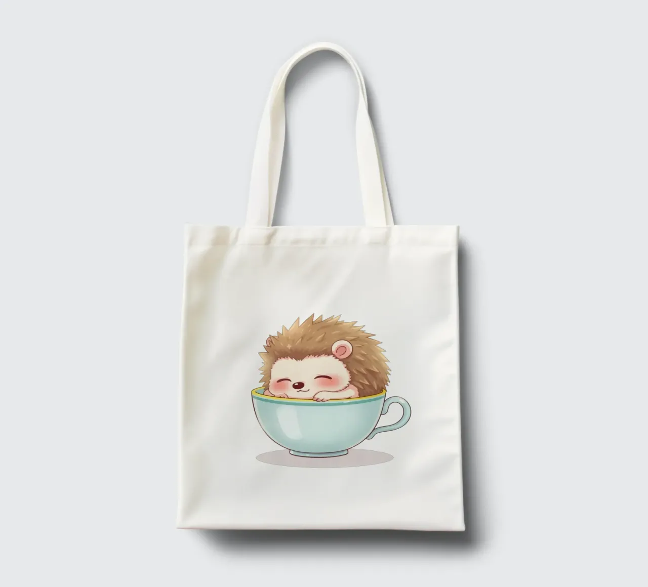 Hérisson mignon se relaxant dans une tasse bleu clair tote bag de DesignDoodle