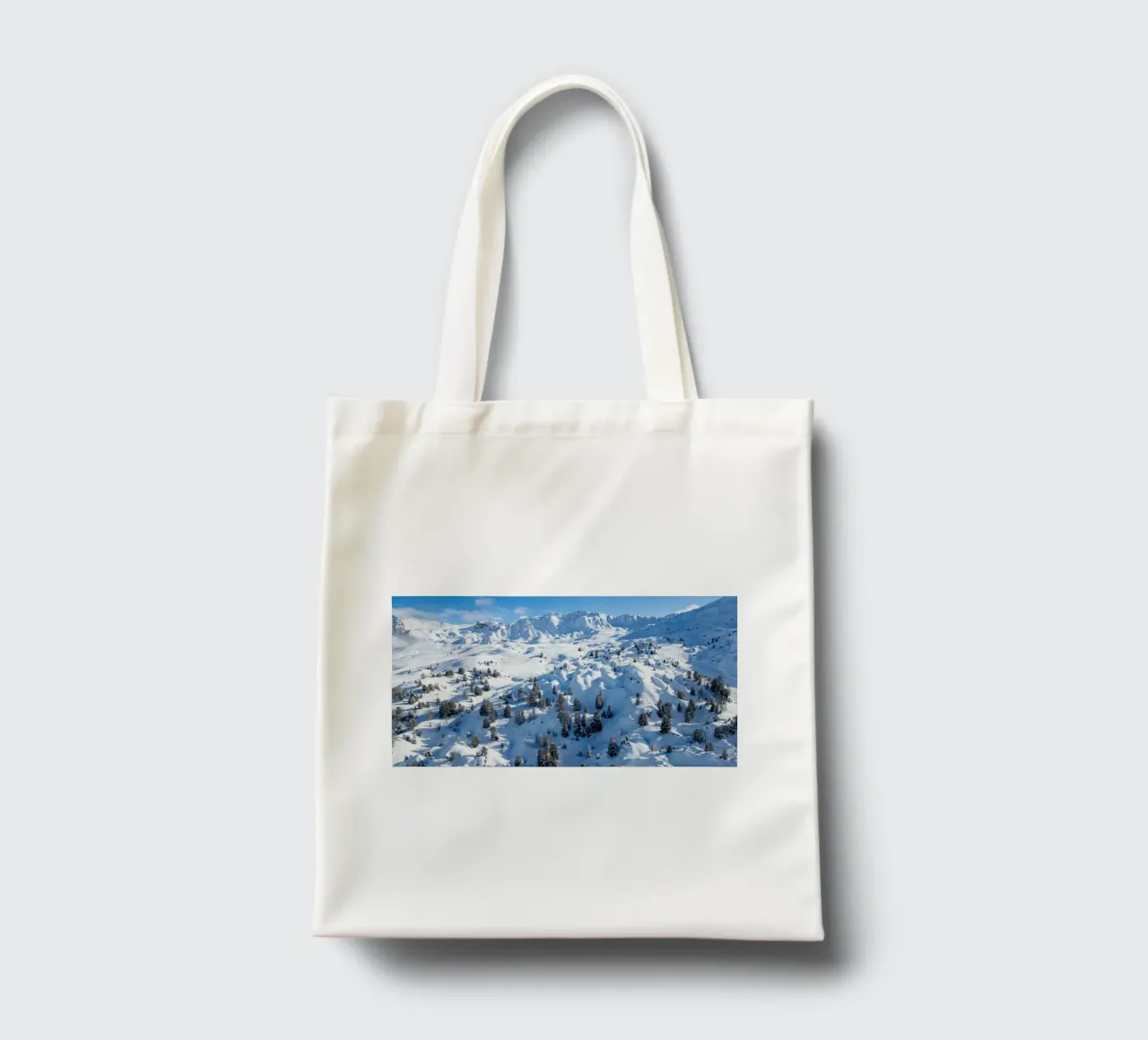 Aerial view of Skiing area of Paradiski, La Plagne, France A tote bag by anderm