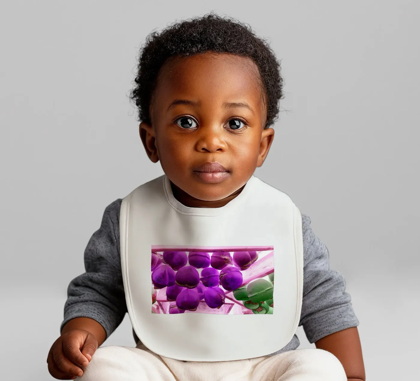 Purple baby bib by Massimo Frascogna