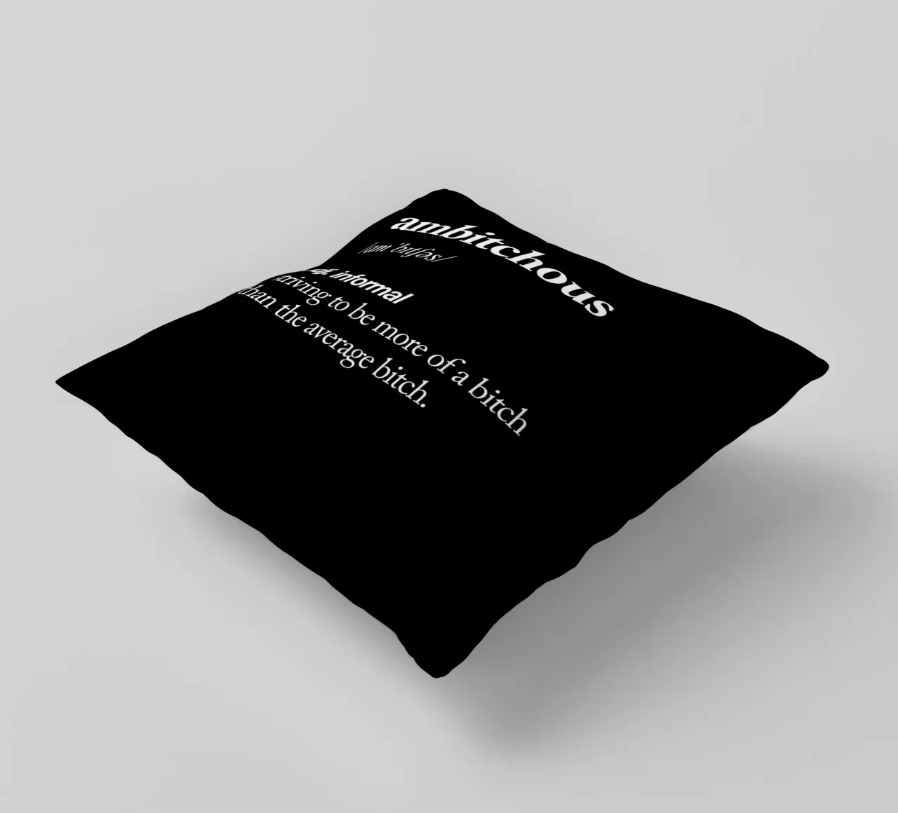 Design tipografico ambiguo in bianco e nero cuscino da THE MOTIVATED TYPE