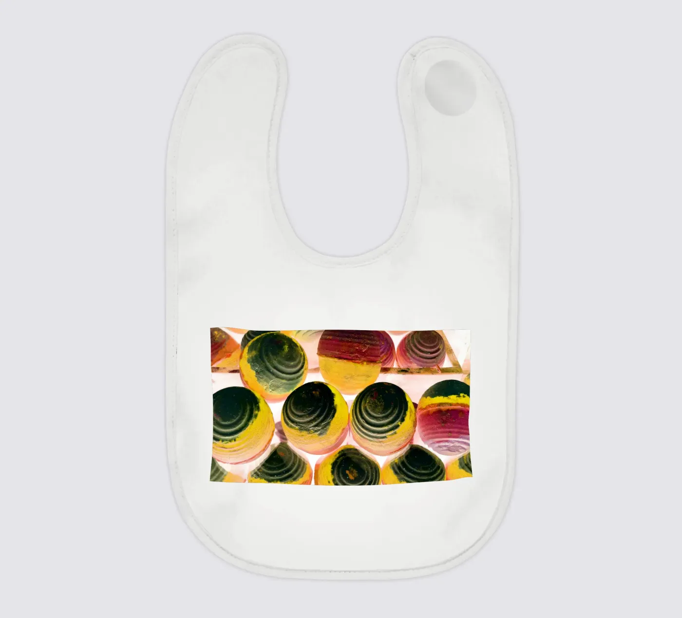 Colored balls baby bib by Massimo Frascogna