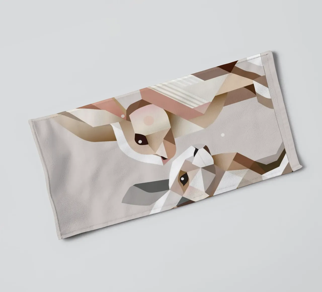 Two rabbits in geometric representation towel by namosh