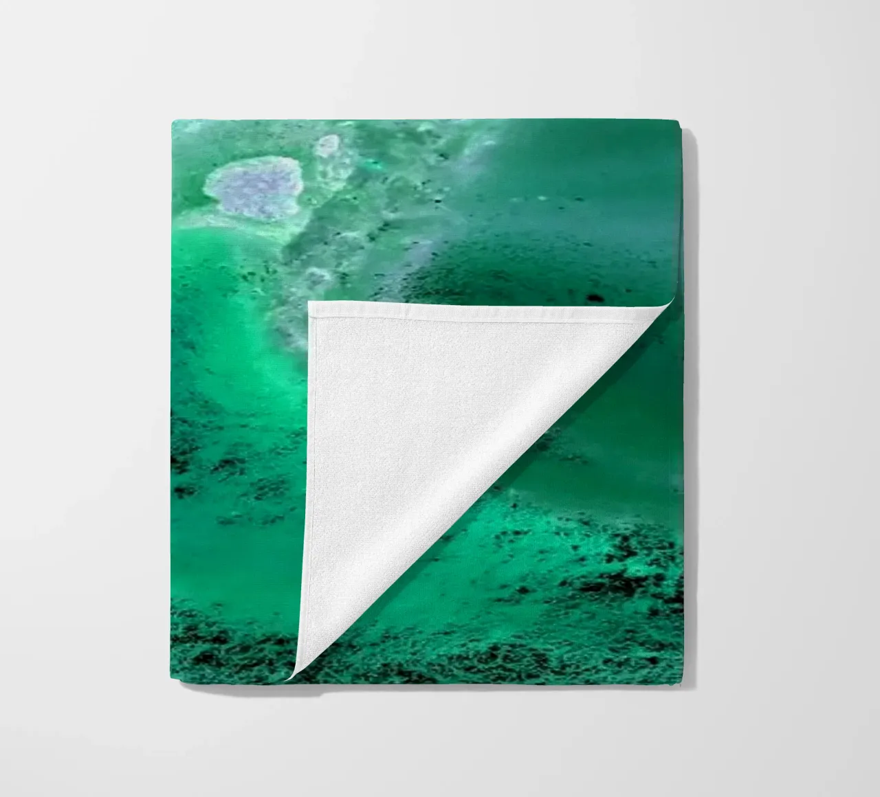 green beach towel by Massimo Frascogna